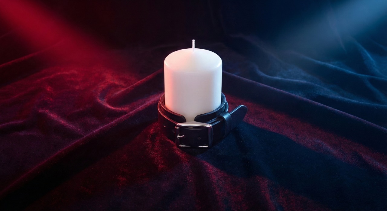 leather-cuff-around-white-candle