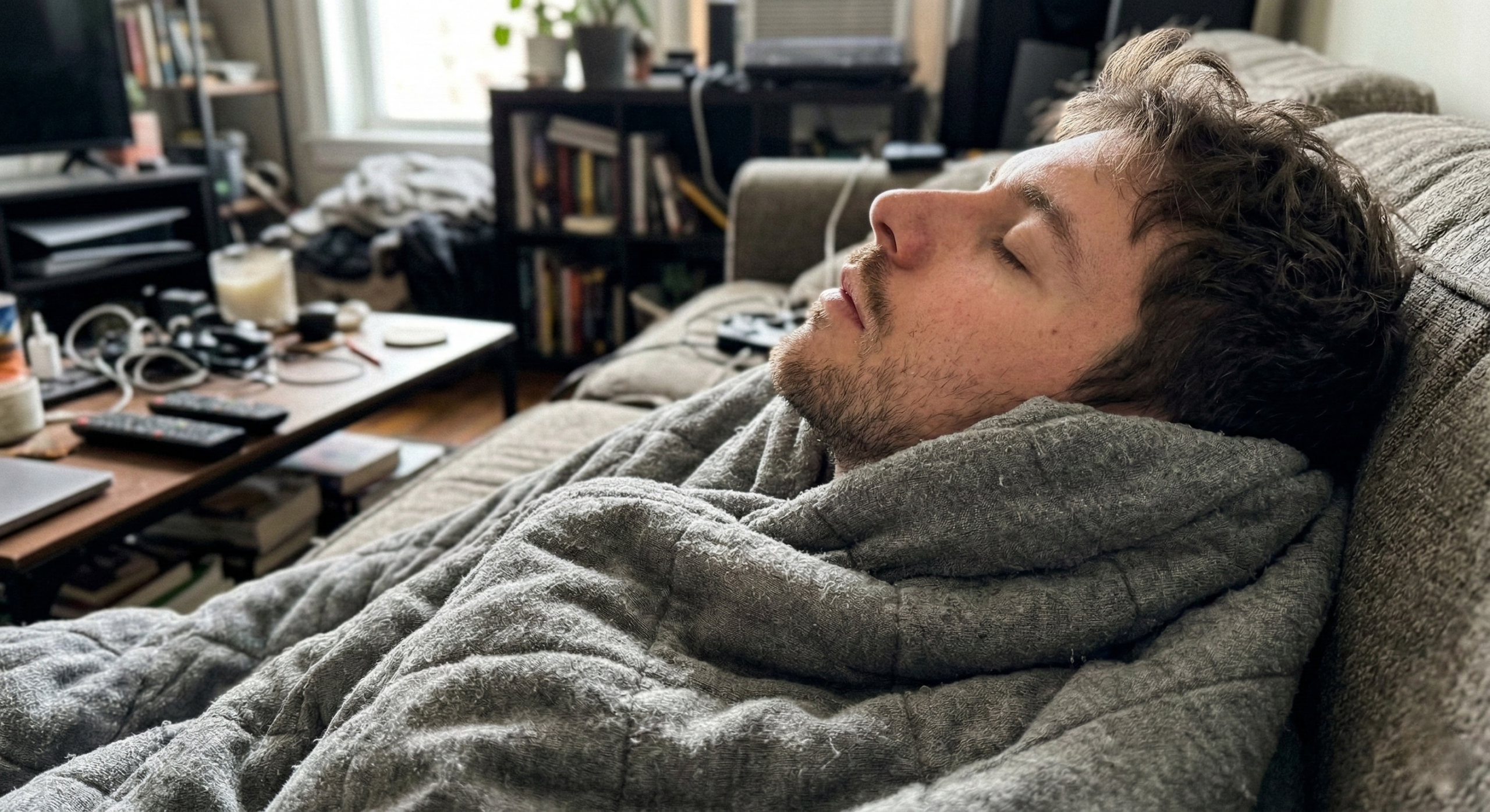crystal-glass-with-milk-near-leather-bound-books